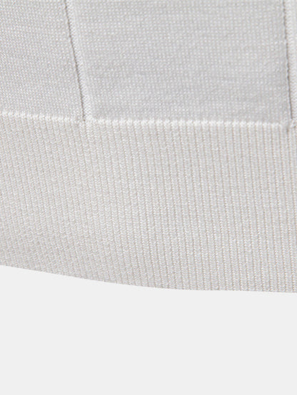 Polo in maglia con cerniera e finiture a contrasto
