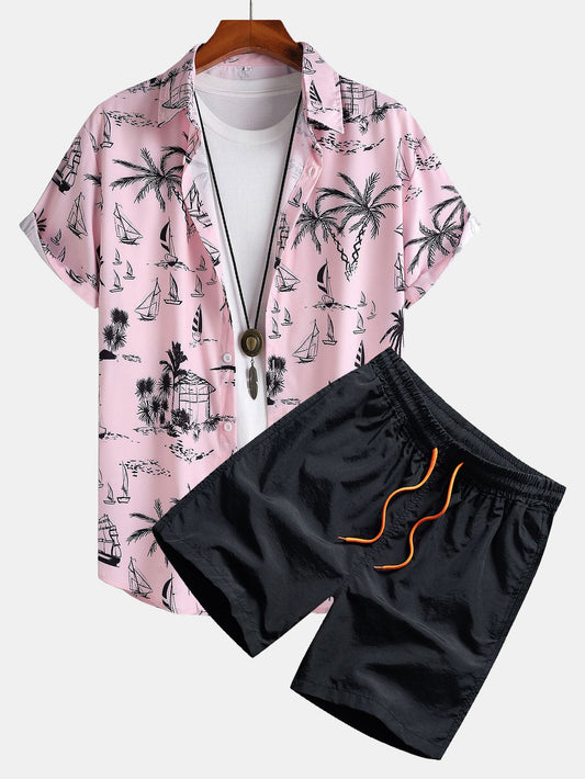 Completo camicia con bottoni e pantaloncini da bagno con stampa di barche a vela con palme