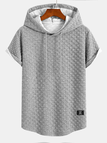 T-shirt con cappuccio in jacquard a scacchiera e orlo ad arco