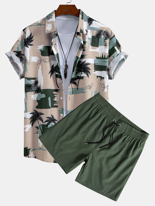 Completo camicia con bottoni e pantaloncini da bagno con design a blocchi di colore con palme