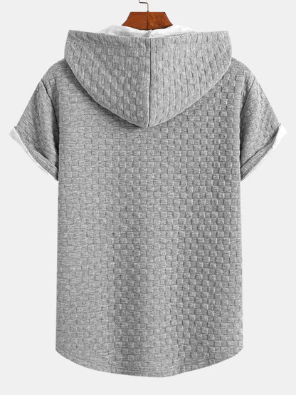 T-shirt con cappuccio in jacquard a scacchiera e orlo ad arco