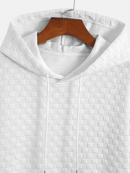 T-shirt con cappuccio in jacquard a scacchiera e orlo ad arco