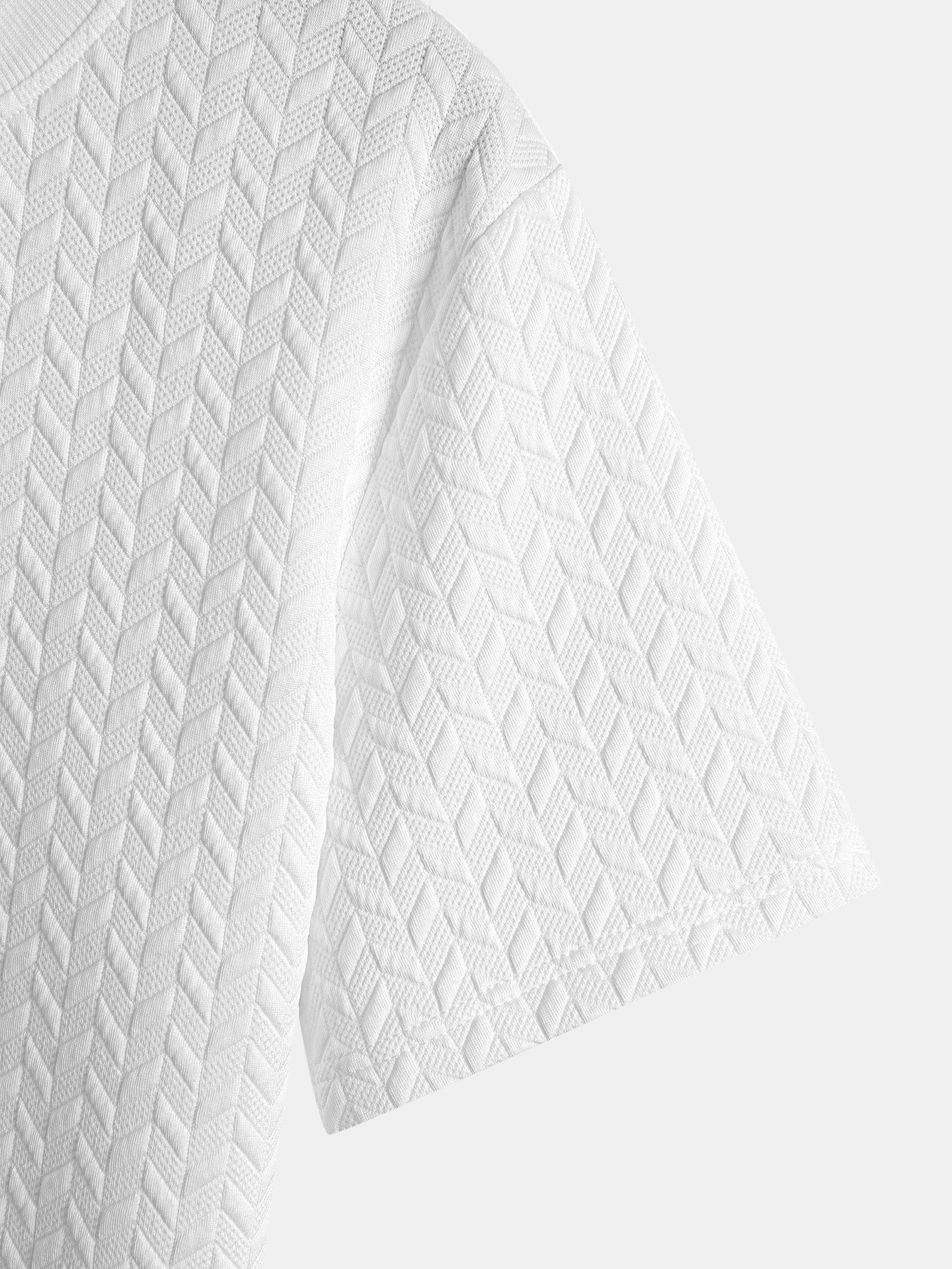 T-shirt con orlo ad arco e trama jacquard