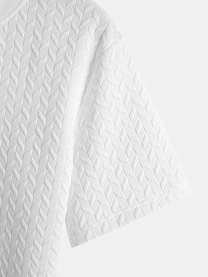 T-shirt con orlo ad arco e trama jacquard