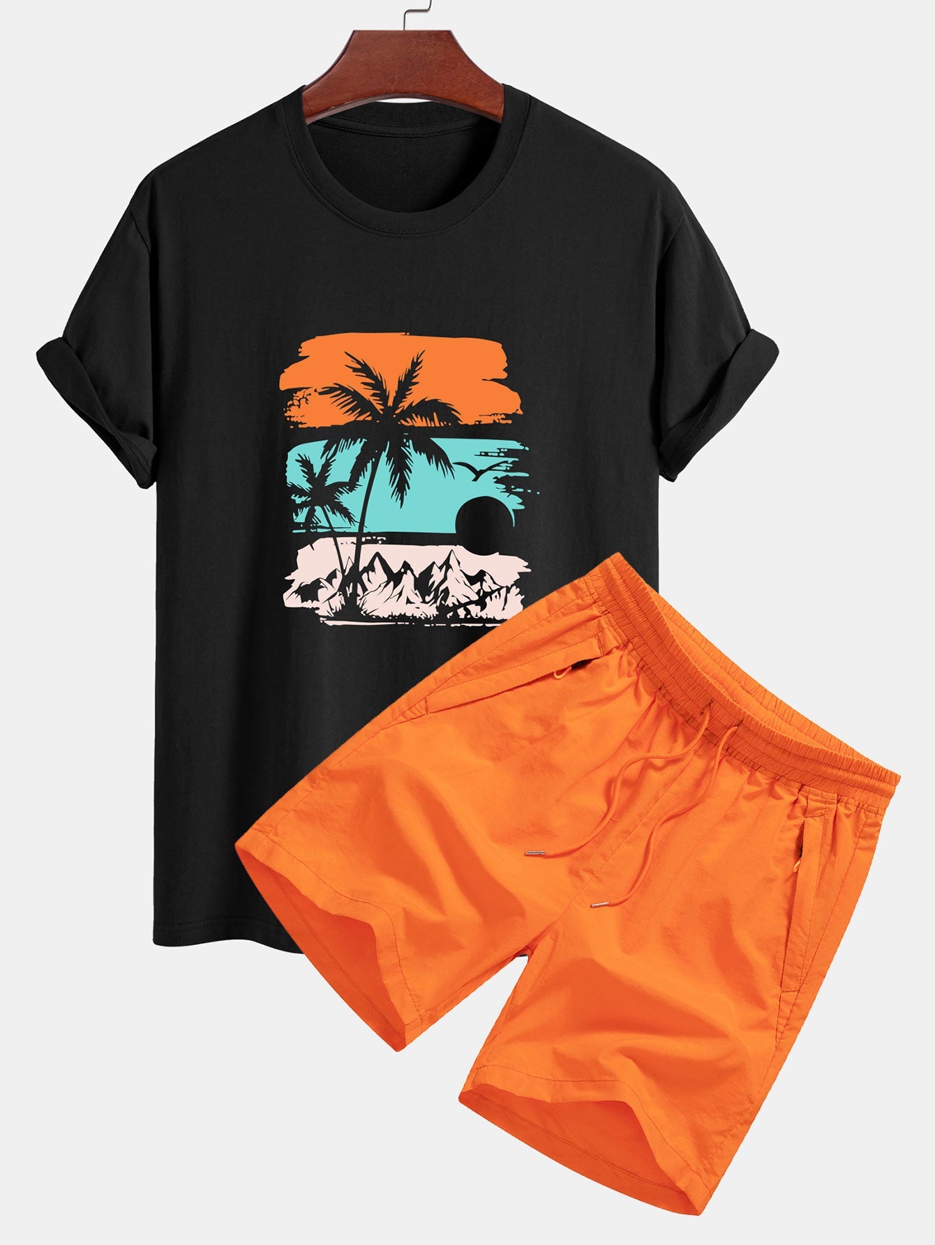 T-shirt in cotone dalla vestibilità classica e pantaloncini da bagno con stampa di silhouette di palma