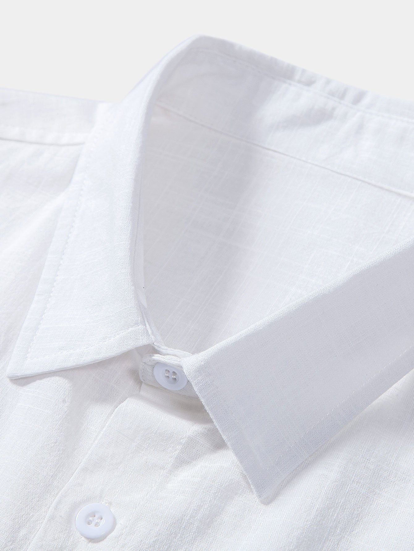Camicia in cotone con bottoni e effetto lino e pantaloncini da bagno a righe