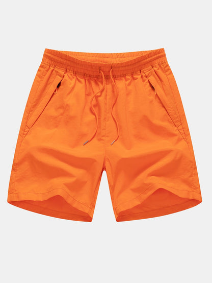 T-shirt in cotone dalla vestibilità classica e pantaloncini da bagno con stampa di silhouette di palma