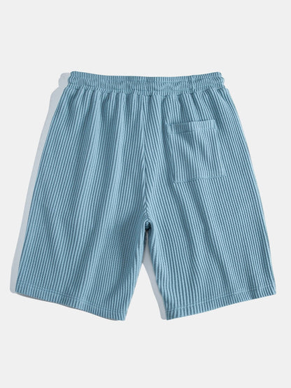 Chemise boutonnée gaufrée avec short gaufré à cordon assorti