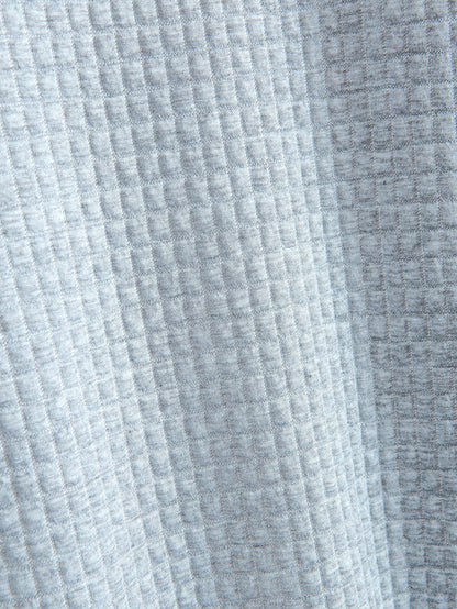 T-shirt a maniche corte in maglia waffle con orlo ad arco e pantaloncini coordinati